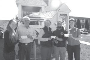 This good-looking crew got together last Friday morning at the Cook County Historical Museum and exchanged more than pleasantries. Each of the three checks shown above was for $1,000 (one from each organization) “to help with our new military exhibit that opens on Friday, May 26,” said Cook County Historical Society Museum Director Carrie McHugh. The exhibit is titled, “On The Line: A Military History of Cook County.” “We will be open every day during the Memorial Day weekend in honor of the new exhibit: Friday - Sunday 11 a.m.- 4 p.m. and Monday 11 a.m. - 2 p.m. Pictured from L-R: Erin Swenson-Klatt (Historical Society), Bob Mattson (American Legion), Carrie McHugh (museum director), Ben Silence (Sons of the American Legion), and Janet Breithaupt (American Legion Auxiliary).