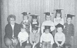 The Zoar Pre-School Center held its graduation ceremony on May 16, 1974 at the Zoar Lutheran Church in Tofte. The evening’s entertainment included a rendition of “A Typical Day at School,” and some remarks by Mrs. Marlin Klose about the success of the school and appreciation for the community’s support throughout the year. Shown in front from left are Robby Revier, David Schmidtman, Mike Dryg and Jon Klose; in back are Mrs. Janet Anderson (teacher), Missy Loh, Toby Nelson, Tommy Rodne, Mary Smetanks and John Young.