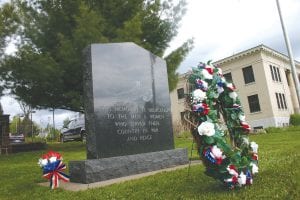 About 75 people gathered on the courthouse lawn for the Memorial Day Service held on Monday, May 29. The wreath was laid, Taps was played, prayers were made, and a tribute to the people who have served the country in the military was held followed by the ringing of the bell for 31 soldiers from the county who died in the last year. See more on page A3.