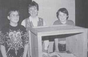 The time capsule was made and sealed by Sawtooth Elementary fourth-graders, with the stipulation that it would be opened in 20 years. Shown with their project in this June 9, 1997 News-Herald photo are teacher Andrea Peterson with students Jamie Olson and Jesse Wannemacher.