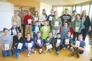 Members of the seventh-grade writers club who contributed to the publication of Meanderings include, front row from left, Cecelia Chmelik, Amy Carpenter, Anna Hay, RaeAnne Silence, Molly LaVigne, Isaac Sandstrom, Merlin Higgins, and Tyler Hamrick. In middle row from left are Ann Mershon, Lucas Martinson, Jonah Schmidt, Taylor DeBoer, Silas Brandt, and Sky Robley. In back row are Wendy Hansen, Steve Surbaugh, Christie Poyirier, Keira Crow, Anna Heeren, Gavin VanDoren, Daunte Deschampe, Isaiah Deschampe, and Sue Nelson.