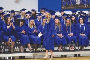 A short introductory speech firmly in her right hand, Hannah Toftey walked past her classmates to introduce the 2017 high school graduation feature speaker Mitch Dorr.