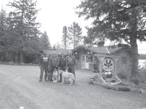 It’s been a fast year for the happy new owners of Rockwood Lodge. As family members, in the beginning the toughest thing about running the lodge was trying to figure out who does what the best. That’s now been ironed out and the two sisters and their husbands (and dogs) are working hard to build up the business. From L-R: Mike Seim, Carol Seim, Stephanie Lightner, and Carl Madsen. Sitting in front from L-R are Gunnar, Jack, and Fresca.