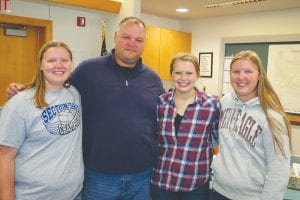 Following his first county board meeting newly elected District 1 Cook County commissioner Robert (Bobby) Deshampe was happily greeted by three of his children. On the left is Maranda, then Bobby, Jordyn and Mariah.