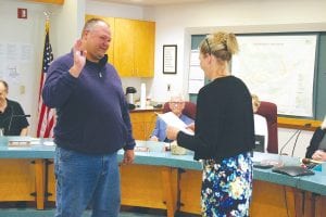 Newly elected District 1 Cook County commissioner Bobby Deschampe took the oath of office administered by Deputy Court Administrator Kim Shepard on June 13.