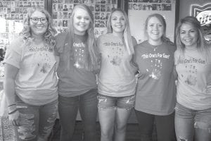 On Friday, June 9, Grandma Ray’s restaurant and bar was the site of a “Make a Wish” scholarship fundraiser held in honor of the late Gunnar Anderson. Anderson, 22, died in a freak snowmobile accident in early January. About $7,000 was raised from the donated auctions and festivities during the evening. Some of the young ladies who helped were (from left) Alexis Eliasen, Sarah Fagerman, Ali Iverson, Rebekah Laky and Breana Peterson.