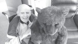 How can you brighten your day? Rolf Skrien found a way by sharing some time with this big fuzzy bear ”Bjorn.” Bjorn, who never missed a stuffed bear meal, is almost bigger than Rolf.