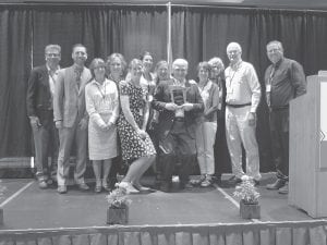 A big contingency of NSHCF Oral Task Force members attended the June 20, 2017 MN Rural Health Conference held in Duluth. This year the task force received the Minnesota Rural Health Team award. Back row, left to right: Karl Hansen, executive director, North Shore Health Care Foundation; Bill Heitzman, advanced dental therapist, Grand Marais Family Dentistry; Georgene Daubanton, Oral Health coordinator; Bonnie Dalin, dental hygienist, Oral Health Education coordinator; Joni Kristenson, RN, PN, Cook County Public Health coordinator; Rita Plourde, CEO, Sawtooth Mountain Clinic; John Bottger, past president, board member, North Shore Health Care Foundation; Todd Lemke, board president, Minnesota Rural Health Association. Front row, left to right: Jetty St. John, grant writer; Dr. Alyssa Hedstrom, Grand Marais Family Dentistry; Paul Nelson, treasurer, North Shore Health Care Foundation, chair, Oral Health Task Force; Teresa Borak, RN, clinical supervisor, Sawtooth Mountain Clinic.