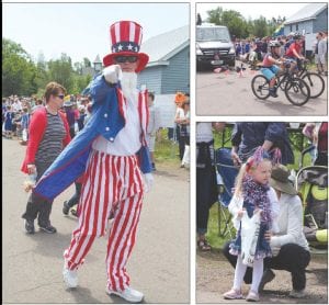 Above left: A Fourth of July parade wouldn’t be complete without Uncle Sam taking part. Is he pointing at the camera, or is he pointing at you? Upper right: Need a tow? Kids on bikes give Cook County Towing a lift in the parade. Above right: This adorable little girl, decked out in her best July 4th clothes and red, white and blue ribbons in her hair, was fully absorbed watching the parade.