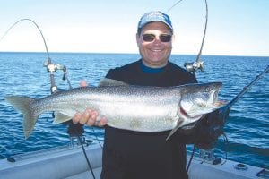 Above: David Witte of Lutsen caught this nice 12-pound lake trout.