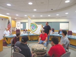 New Cook County Commissioner Bobby Deschampe presented the Grand Portage Band of Lake Superior Chippewa flag to the county at the commissioners’ Tuesday, July 18 meeting. Highlighting the presentation were two songs played and sung by the Grand Portage Stone Bridge Singers drum group. The flag was a gift from the band and will now be displayed in the commissioners’ room next to the U.S. flag.