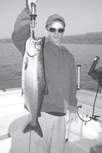 13-year-old Jake Rosenow from Iowa had a great day of fishing, catching a 9-pound king salmon and a 20-pound, 37-inch lake trout on the same trip.