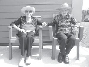 Left: Two long-time dear friends, Gladys Dockan and Ione Jones, recently enjoyed some patio time reminiscing about the past. Ione Jones will turn 100 on August 30! Above: Many well wishers were on hand on July 12 to help Lu Pettijohn celebrate her 104th birthday. Congratulations Lu!