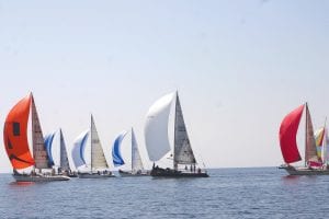 The Grand Marais waterfront came alive last Saturday at noon as 10 sailboats lined up just outside the harbor wall and with the blast of an air horn, started racing for Thunder Bay. The 2017 International Yacht Race featured nine Canadian and one Michigan sailboat. Fleet Captain of the Thunder Bay Yacht Club Bob Vander Ploeg said the annual race began in the late 1960s. The sailboats were from 30 feet to 40 feet long, and most were equipped with colorful spinnakers (sails) that filled with wind and ballooned out in front of the boats much to the delight of those watching from the shore or Artist Point right before the air horn sounded to start the race.