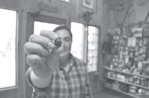 It wasn’t heavy enough to make her arm shake from holding it up, but this is one big blueberry. This bruising blushing bombastically big beautiful blueberry took first place in the opening week of the Biggest Blueberry Contest held on the Gunflint Trail.