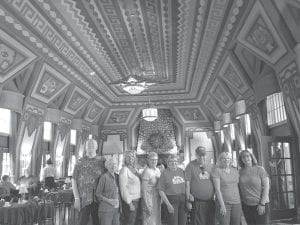 There’s no prettier dining room than the one at Naniboujou, and the food is great too! In the front row from left to right are Tom Hedstrom, Betty Michaud, Darrellyn Barrett, Geri Jensen, Kaye Kraft, Fred Schmidt, Kim Nelson and Nancy Dumas.