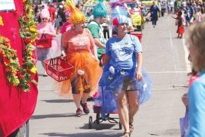 Looking festive in their parade caps, shirts, skirts and other joyful attire, the crew from Joynes Ben Franklin Department Store was a big hit with the throngs of parade watchers as they marched through Grand Marais in the Sunday, August 6 Fisherman’s Picnic parade. Joynes took second place for the Most Original Float in the parade.