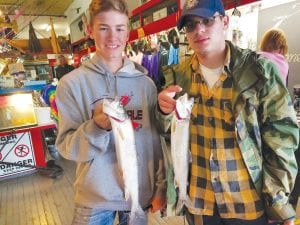 Tyson from the Beaver House sent this picture to the newspaper of these two happy young anglers who picked up a couple of nice lake trout while fishing with Beaver Flicks off of the break wall near the U.S. Coast Guard Station. As of late, fishing in the big lake has been great.