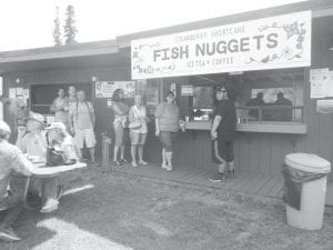 One of the more popular places at the Grand Portage Pow Wow and Rendezvous Days was the food stands. Here are people lined up for fish nuggets at the new Elder stand.