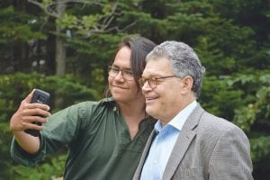 Ranger Jaden Aubid enjoyed an opportunity to pose for a “selfie” with Senator Al Franken as he toured the Ojibwe Village exhibit at Grand Portage National Monument on Sunday, August 20.