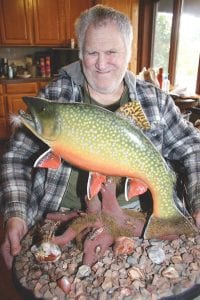 Many people know about Dave Asproth’s fly tying skills, but he also happens to be a talented carver. Dave spent two years whittling a piece of basswood into a brook trout. A talented baker, Dave used an airbrush for cake decorating to paint the fish.