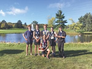 The North Shore Storm varsity boys’ team took top honors at the Swain cross country meet in the Class A race. Holding the trophy is Jake Paron. Behind Jake (from left) are Will Surbaugh, Isaac Swanson, Leif Anderson, Noah Smith, and JC Holman. Brenden Seipke is not pictured.