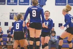 The Cook County girls’ volleyball team celebrates after taking a win on their home court. For the third straight year the two-time defending Section 7A champion Vikings won the Polar League Conference crown. A sweep of the Cromwell Cardinals on October 12 gave the Vikings a perfect 10-0 record in conference play and sealed the title for the victorious Vikings.