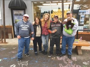 While there were a great many participants taking part in the 2017 Moose Madness medallion hunt, this year’s super sleuths who followed the clues that led them to the medallion were Ryan, Angel, Michael and Brian Stichter from Princeton, Minnesota. Standing in the middle of the Stichter family with her arms around Angel and Brian is Visit Cook County’s Anna Klobuchar, the mastermind behind the clues.