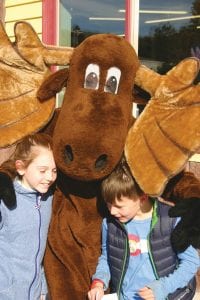 Murray the Moose was all over Grand Marais last weekend for the Moose Madness festivities. At times Murray was directing traffic, at other times Murray stopped to help a local musician play guitar. And always, this magnanimous moose was more than willing to “moosey” up to people young and old and give out warm, furry hugs, which always brought a smile to everyone’s face. See more Moose Madness on page A3.