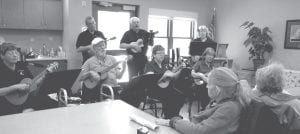 Above: On October 27, the residents were treated to some unique ukulele music when the Two Harbors Ukulele Group (T.H.U.G.) travelled to the Care Center for a performance. Left: Mary and Jim Schliep brought their accordions to the Care Center on October 17 for our Oktoberfest celebration. The residents truly enjoyed listening to some of their favorite polka tunes.