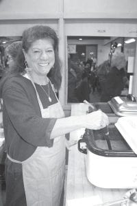 There were 86 volunteers who helped with empty bowls. They set up tables, served the meal, stirred the soup, ran the silent auction and cleaned up afterward. And most of them had a big smile on their face!