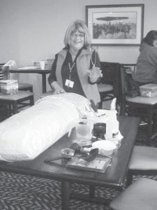 Above: Sharon Olson won the prize at the caregivers conference. She successfully guessed the contents of the mystery pillow. Left: John Morrin was recognized as an “Outstanding American Indian Tribal Official” by the Minnesota Indian Education Association (MIEA) during the conference and banquet held November 16, 2017, at Treasure Island Resort.