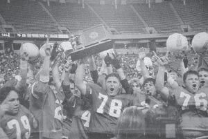 For the first time ever, the Cook County Vikings won the state football championship with a 13-12 victory over Adrian on Nov. 22, 1997. Members of the team are shown in this Dec. 1, 1997 front-page photo holding the trophy during the post-game celebration. It was estimated that nearly 5,000 fans watched the Minnesota Class A championship game at the Metrodome in Minneapolis.