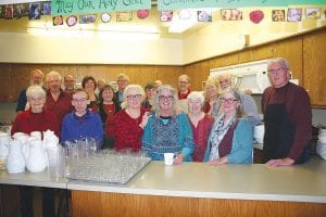 It truly takes a village to, well, feed a village. In its 44th year, the Thanksgiving meal was a big hit. Once again a large team of dedicated volunteers who are pictured here helped to prepare the meal, set-up and cleanup for the meal that is held at the Grand Marais First Congregational Church. Besides the people pictured, others help by making pies and bread for the Thanksgiving feast.