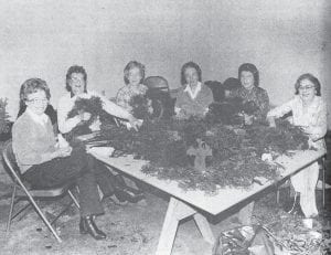 The Grand Marais Garden Club is shown making wreaths from princess pine and other materials in this Dec. 8, 1983 photo. The proceeds of the holiday sale— over $1,100—were donated to the Hospital Auxiliary’s annual fundraising drive. Shown, from left, are Raha Scott, Mary Williams, Linnea Flodquist, Connie Thomas, Agnes Russell and Nancy Benson.