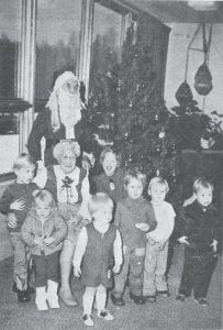 Santa and Mrs. Claus passed out gifts to children at the North Shore Hospital Auxiliary Christmas party on Dec. 18, 1974. Oscar Johnson (Santa) and Liz Border (Mrs. Claus) pose with the children in attendance, from left, Teddy Critchley, Cindy and Brian Allen, Tawnya Schlienz, Curt Everson, Ricky Backstrom and Michael Lillo.