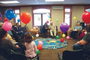 It’s not often one can find the Grand Marais library filled with birthday balloons, cake, and — breaking every rule for a library —people reading and talking out loud. But there are exceptions to every rule and the library staff went all out to host a 93rd birthday party for Grandpa Lyle Gerard, who has read to countless Cook County school children over the past 33 years. While his eyes are failing his wit is not. As one person after another returned the favor and read to Grandpa Lyle, the room was filled with laughter and joy. “I can’t thank the library staff and all those who attended enough,” said a genuinely touched Grandpa Lyle several days after the party had occurred.