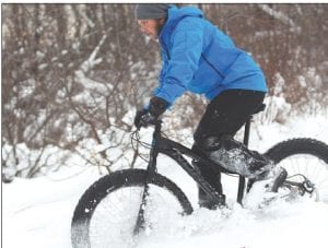 A little snow wasn’t going to deter this bicyclist who is powering through the fluffy stuff on a fat-tire bike. Fat-tire bikes have allowed bicycle enthusiasts the ability to ride year round and races like the Lutsen Norpine Classic are now being held for these riders.