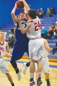 Jordan Porter avoided the block of Cromwell’s Gage Jones. Despite having his eyes closed, Porter scored two points on this play and was one of the bright spots for Cook County in the Cromwell game.