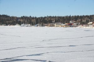 Following the extreme cold, it didn’t take long for the Grand Marais harbor to form a thin coat of ice. While it is not remotely safe to walk on, in 2013 the harbor froze over enough so that people ice fished for a short period of time, with several nice catches of lake trout reported. This picture was taken Wednesday, December 27, a day that saw the temperature warm up to a balmy zero. An oddity was that no birds were seen anywhere around the harbor.