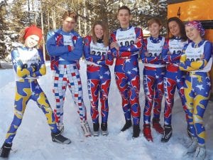 Looking snazzy in their “retro” cross country ski uniforms, the Nordic skiers from Cook County High School pose for a picture at the most recent race in Two Harbors. The meet was held on trails built with an axe and grub hoe by the late Charlie Banks, a legendary promoter of winter sports in the Northland. From L-R: Danny Berka, Josh Prom, Malin Anderson, Trent Spry, Robin Henrickson, Louise Ramberg and Linnea Henrickson.