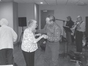 The residents were delighted to have Portage Band back after the holidays. Pictured here are Skip Rouser and Ken Netland on the dance floor.