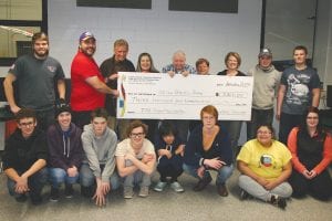 The Cook County School District I.S.D. 166 Education Foundation recently presented the robotics team with a check for $3,300. Shown in front L-R: John VanderHeiden, Linnea Gesch, Kestrel Pollock, Jack Fredrickson, Jron Tamanaha, Keenan Hingos, Alize Pierce, Ashleigh Precord. Back row L-R: Joe James, coach Rob Hackett, CCEF Foundation members Doug Sanders, Ann Sullivan, Hal Greenwood, Pat Campanaro, Devlin Duvall, Noah Works, and Adrian Howard-Larsen.