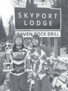 Below left: Placing first and second in the 700 class at the snowmobile drag races were Anders Zimmer (2nd) and Blake Lambert.