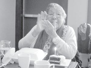 Above: Doris Blank enjoying her 94th birthday celebration. Left: Michelle ”Tubby” Tesser with her bingo winnings.