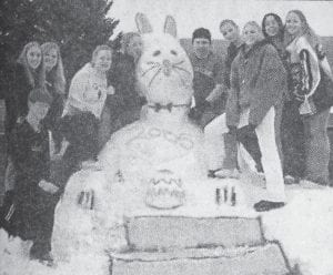 The junior class at Cook County High School made an Easter Bunny snow sculpture from one of the big snow piles in front of the school in March 2004. Pictured, from left, are Ben Seglem, Christine Blake, Hannah Laky, Ashley Jacobsen, Brittney Kautz, Andy Rysdahl, Britta Muus, Stephanie Williams, April Clearwater-Day and Kayla Johnson.