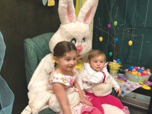 Although it was colder than a North Pole reindeer’s nose outside for the Easter egg hunt last Saturday morning, it was warm inside the Community Center, especially when it came time to sit on the Easter Bunny’s lap. Above, a gleeful Sabrina and somewhat unsure Rosalyn Dusheck get a nice furry hug from the loveable bunny. Sabrina and Rosalyn are the children of Reid Dusheck and Emily Marshall of Grand Marais.