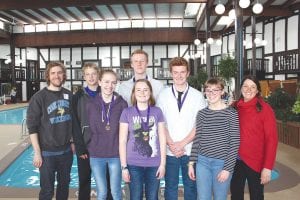 Cook County I.S.D. 166’s Knowledge Bowl team is all smiles after taking fourth place at the State Knowledge Bowl competition. From L-R: Coach David Liechty, Adam Dorr, Linnea Gesch, Amelia Roth, Andy Kern (in back of Amelia), Leif Anderson, Robin Henrikson, and coach April Wahlstrom.