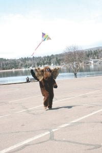 What do you do when the wind won’t blow and you want to fly a kite? Enlist some moose power, that’s what. Murray the Moose made a guest appearance at the kite festival and, after hoof-fiving with a bunch of excited children, demonstrated his ability to fly a kite even when the wind was playing hide-and-seek with the professional kite flyers.