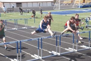 The Vikings might not have any track and field to train on, but that doesn’t mean they aren’t good at the sport. Both the boys’ and girls’ teams competed at Esko, and both performed admirably in the blue and white. Up top, leading the hurdles race is Jack Haussner while below, a baton-wielding Keegan Morrison sprints down the track. Claire LaVigne passes the baton to Robin Henrikson in the girls’ 4x200-meter relay.